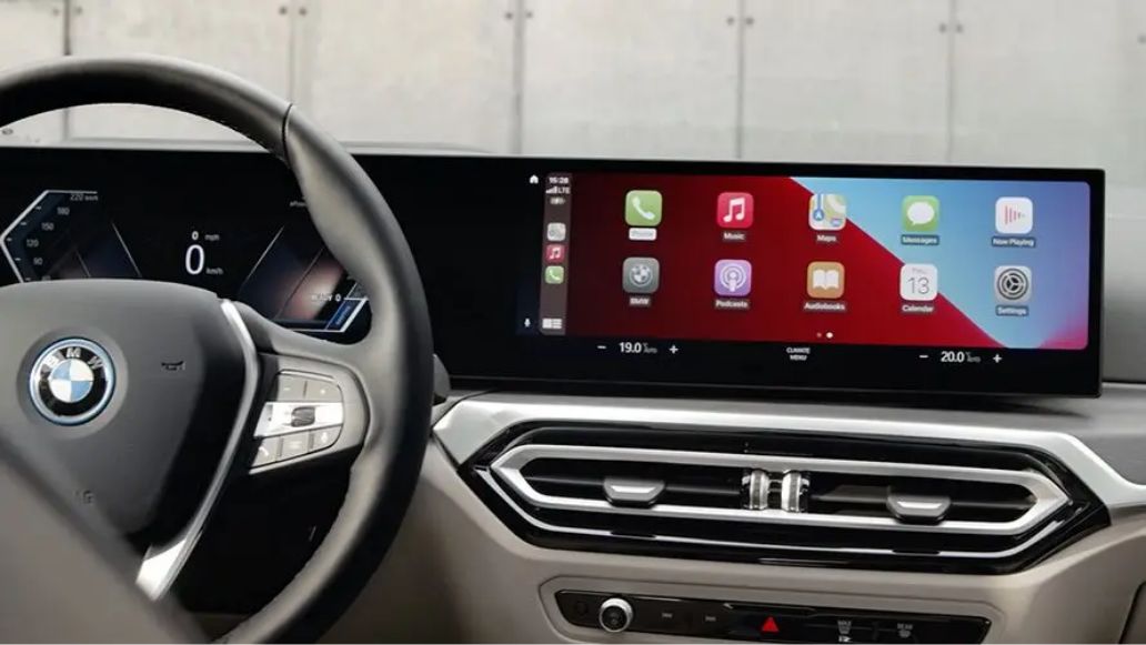 A BMW interior, showing a dashboard and the steering wheel